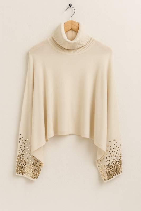 Pull à col roulé – Manches pailletées