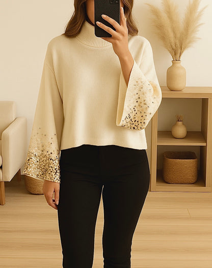 Pull à col roulé – Manches pailletées