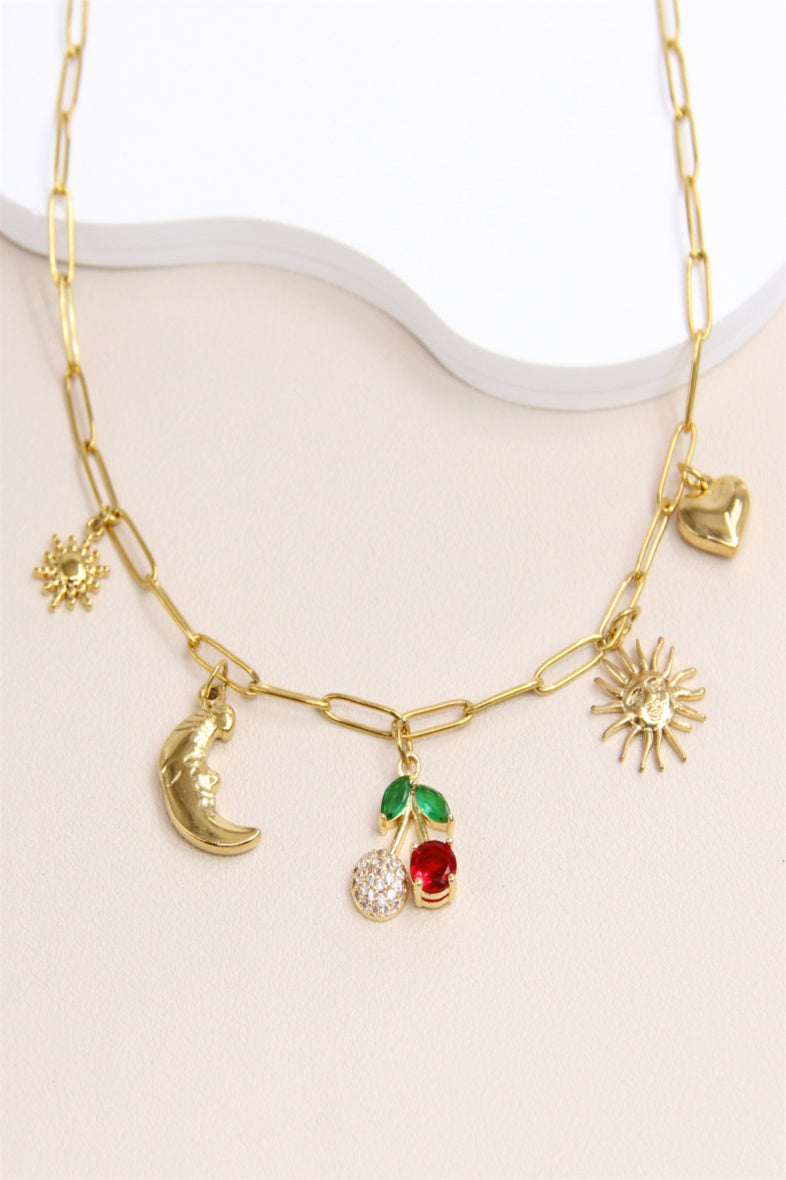 Collier doré à pendentifs charms – Lune, Soleil & Cœur