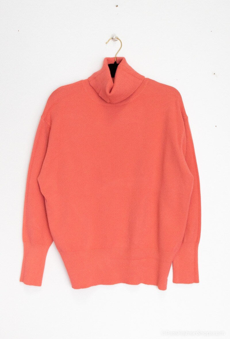 Pull col roulé en maille – Corail