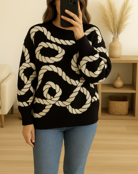 Pull oversize noir à motifs graphiques blanc